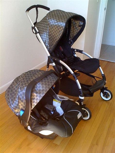 gucci baby stroller and carseat.